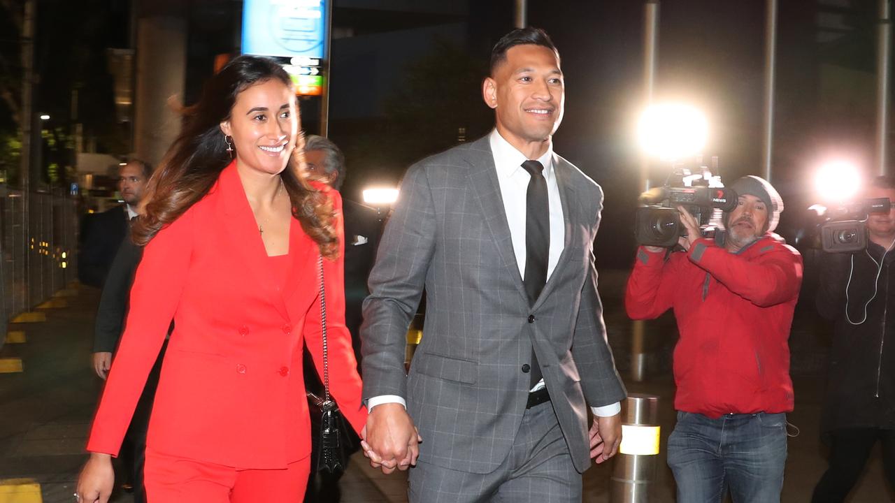 Former Australian professional rugby league player Israel Folau and wife Maria Folau leave the Federal Circuit Court in Melbourne Monday, December 2, 2019. (AAP Image/David Crosling) NO ARCHIVING