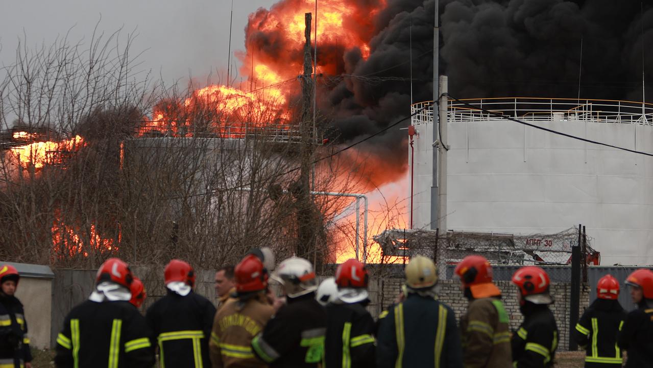 Firefighters battle a blaze at an industrial facility after a Russian military attack in Lviv. Picture: Joe Raedle/Getty Images