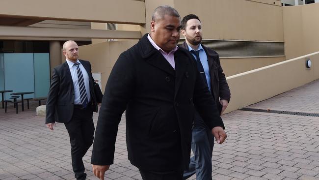 Former CFMEU official Fihi Kivalu is arrested after appearing at the royal commission into trade union corruption hearing in Canberra two weeks ago.