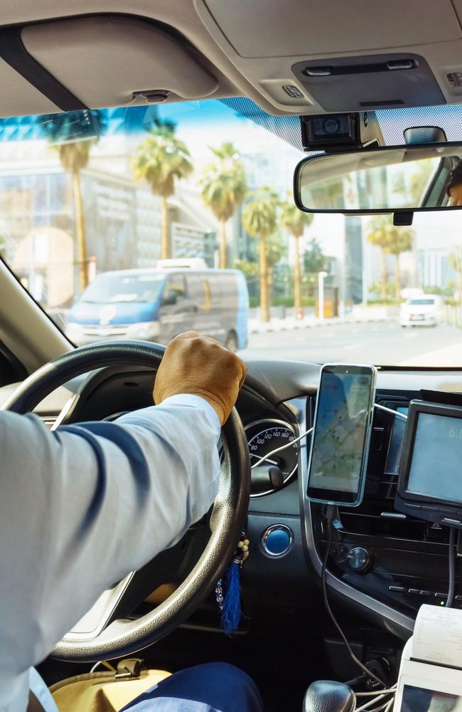The woman said she signalled for her mother's cab driver to come back to help her but claims they drove off.