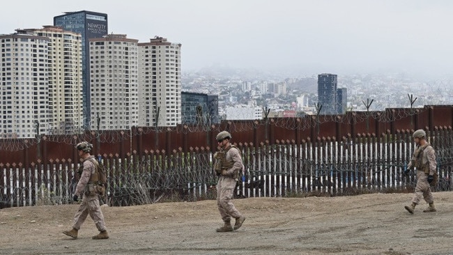 US Marines patrol near the San Ysidro entry point on the San Diego side of the border with Mexico. Picture: Carlos A. Moreno/Zuma Press