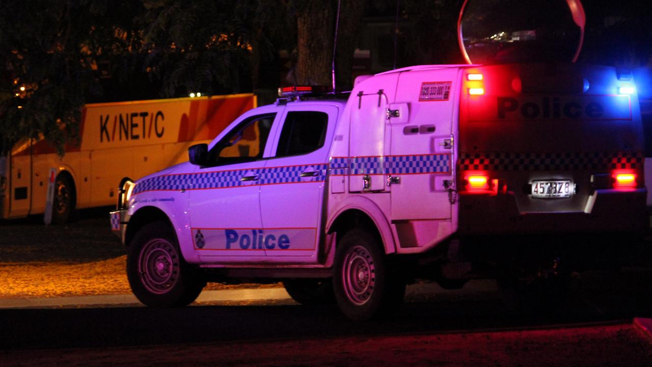 Emergency services are at the scene along Bacon St in Moranbah where a man is trapped under a bus. December 30, 2022. Picture: Andrew Kacimaiwai