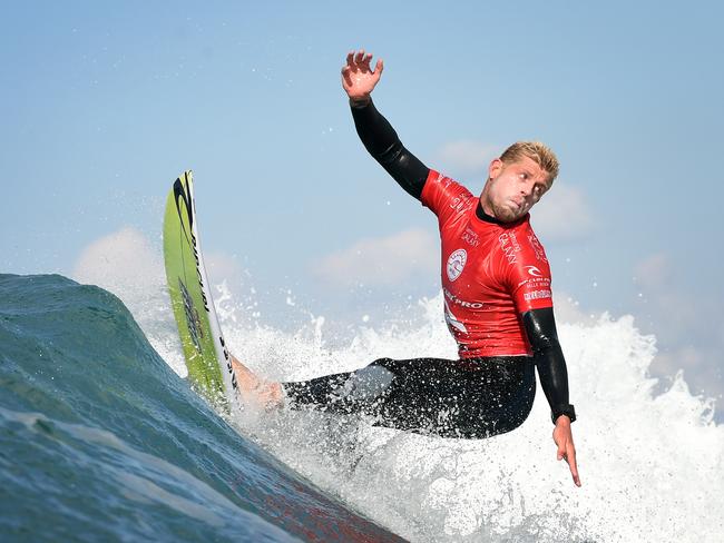 Bells Beach Bells Beach Rip Curl Pro winner Mick Fanning, powers through a top turn during his semi final win over Jordy Smith (South Africa). Picture: Jason Sammon