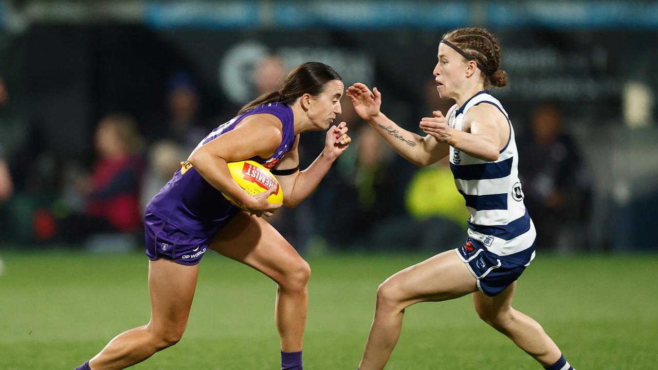 Geelong’s Mikayla Bowen closes in on Fremantle’s Laura Pugh during Tuesday’s night loss at GMHBA Stadium. Picture: Michael Willson/AFL Photos via Getty Images