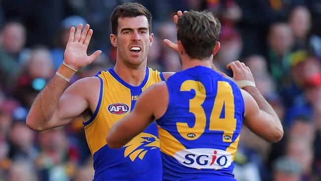 Scott Lycett celebrates a goal with Mark Hutchings.