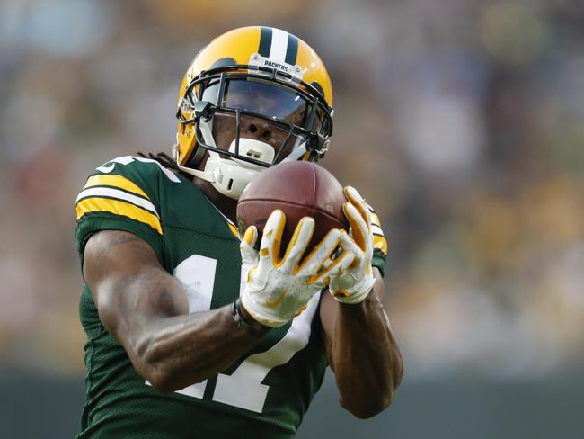 Green Bay Packers' Davante Adams catches a pass