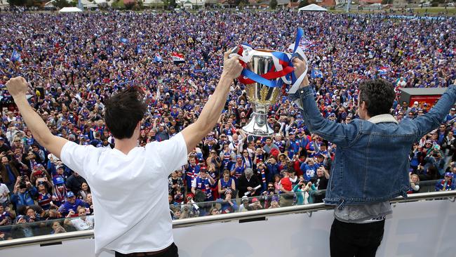 As many as 30,000 Bulldogs fans packed Whitten Oval before Easton Wood and Bob Murphy showed off the premiership cup. Picture: Michael Klein