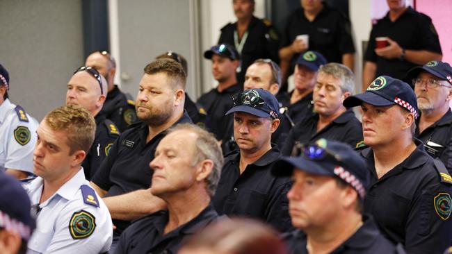 Volunteers are briefed ahead of leaving for NSW. Picture: AAP Image/Josh Woning