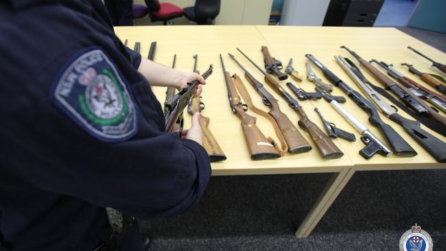 Police uncovered a number of guns hidden in the roof of a Bundanoon home during a raid. Picture: NSW Police