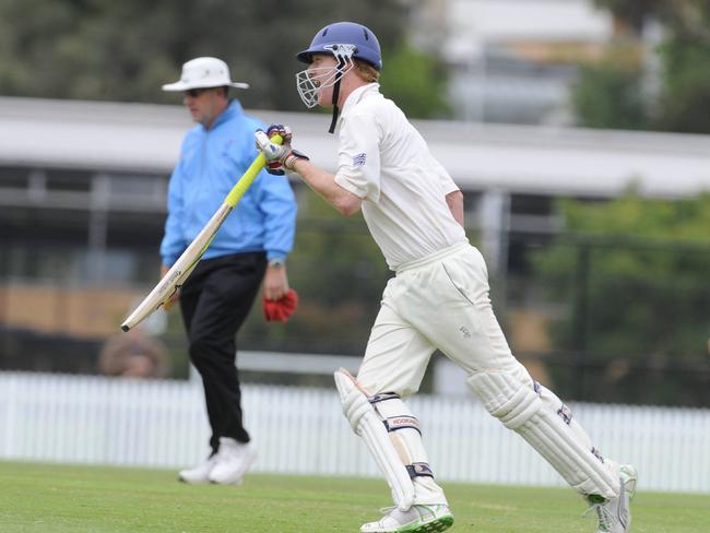 Dandenong batsman Justin Butterfield roars with delight after the Panthers secured a first-innings victory.