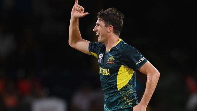 ST VINCENT, SAINT VINCENT AND THE GRENADINES - JUNE 22: Pat Cummins of Australia celebrates after dismissing Gulbadin Naib of Afghanistan (not pictured) for his hat trick during the ICC Men's T20 Cricket World Cup West Indies & USA 2024 Super Eight match between Afghanistan and Australia at Arnos Vale Ground on June 22, 2024 in St Vincent, Saint Vincent and The Grenadines. (Photo by Gareth Copley/Getty Images)