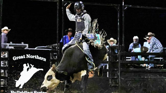 Brayden Spina competes in the Great Northern Bull riding series bull ride event at the Mossman Showgrounds. Picture: Stephen Harman