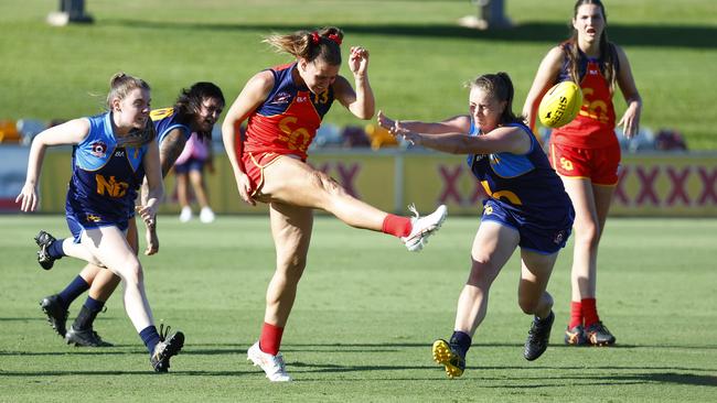 South Queensland's Jessica Harvey clears the ball in the AFL Queensland representative match between North Queensland and South Queensland, held at Cazalys Stadium, Westcourt. Picture: Brendan Radke