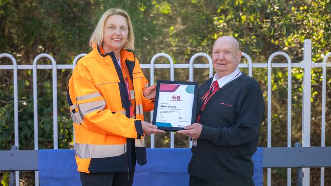 Gympie North Assistant Station Master Mervyn Suares is celebrating a milestone that most will never see - 60 years of continuous employment at Queensland Rail. He is pictured with Qld Rail CEO Kat Stapleton.