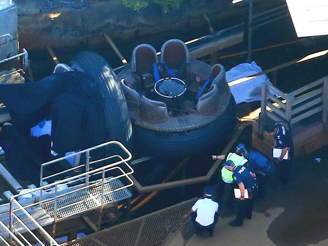 Police are seen assessing the scene after the incident. Picture: David Clark