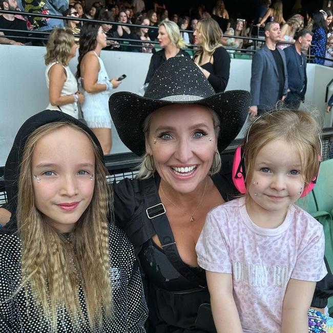 Box with her daughters Trixie and Daisy at the concert on the weekend.