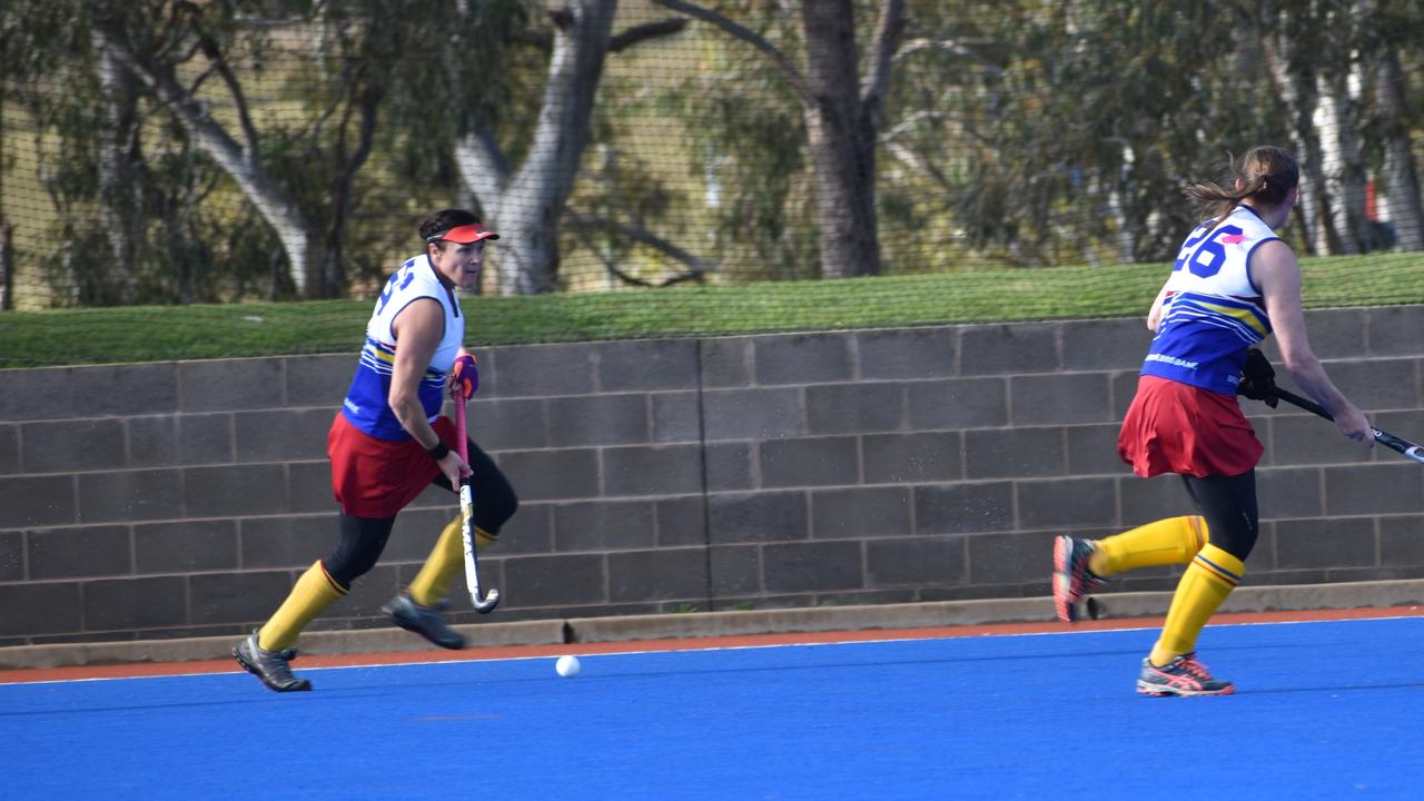 Monique Nacsa in possession for Brisbane in their match-up with Maryborough at the 2021 Queensland Hockey Women's Masters Championships.