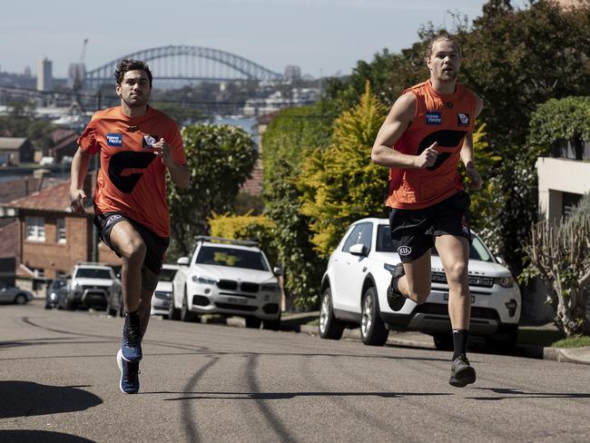 Taranto and Himmelberg run hill sprints near their home in Sydney in April. Picture: Ryan Pierse/Getty Images