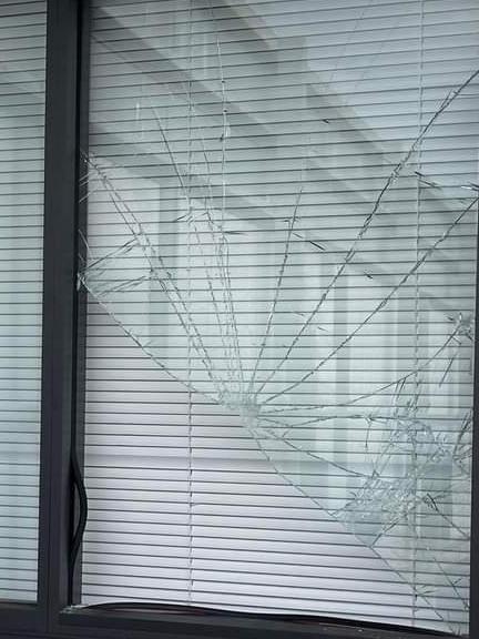 Shattered window at Harmony Family Medical Centre in Cairns on June 5 used by youth crims to break and enter premises. Picture: Facebook