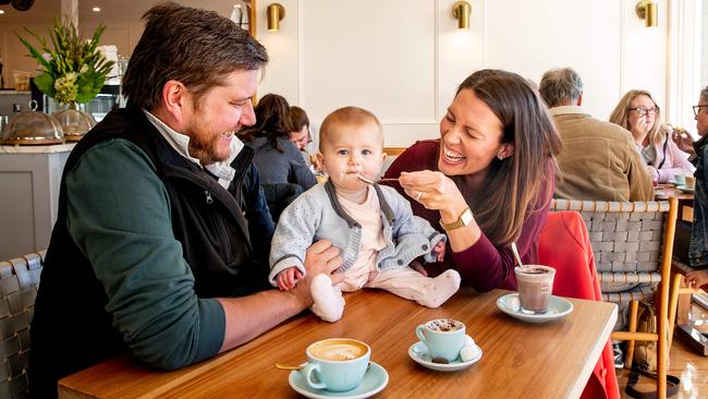 Former Sydneysiders Nick Pike, Kathryn Pogson-Pike and their 10-month-old daughter Beatrice are loving life in Bowral. Picture Ryan Osland