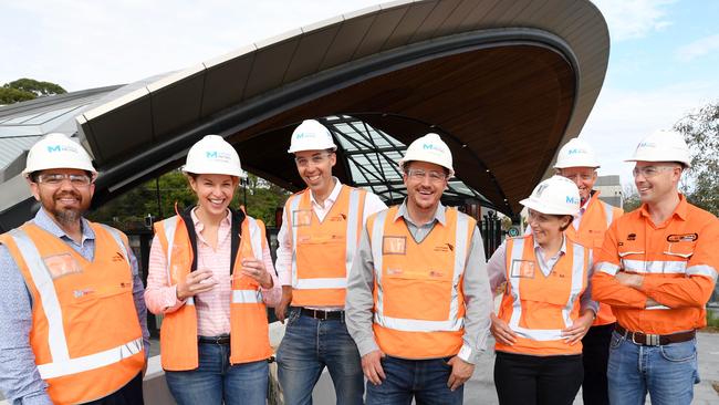 Sydney Metro workers L-R: Bijan Hassanzada, Kirsten Evans, Andrew Knispel, David Saggerson, Katherin Scevity, Rodd Staples and Scott Connor outside the Hills Showground train station in Castle Hill. Picture: Tracey Nearmy