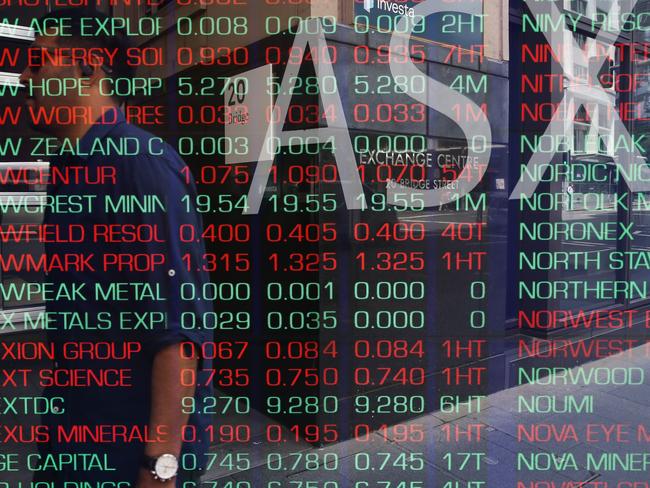 SYDNEY, AUSTRALIA - Newswire Photos -November 14, 2022 A general view of members of the public walking past the digital boards at the ASX in Sydney. Picture: NCA Newswire / Gaye Gerard