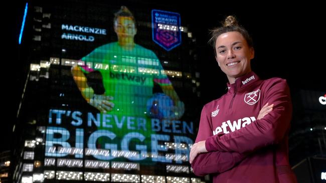 LONDON, ENGLAND - SEPTEMBER 29: Mackenzie Arnold poses in front of Barclays Global Headquarters in Canary Wharf, as WSL players are projected onto it celebrate the Barclays Women's Super League Start of Season, on September 29, 2023 in London, England. (Photo by Eamonn M. McCormack/Getty Images for Barclays)