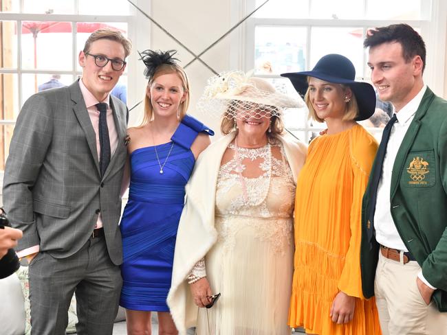 Gina Rinehart poses with a group including Olympic gold medallist Mac Horton at the Melbourne Cup. Picture: Jason Edwards