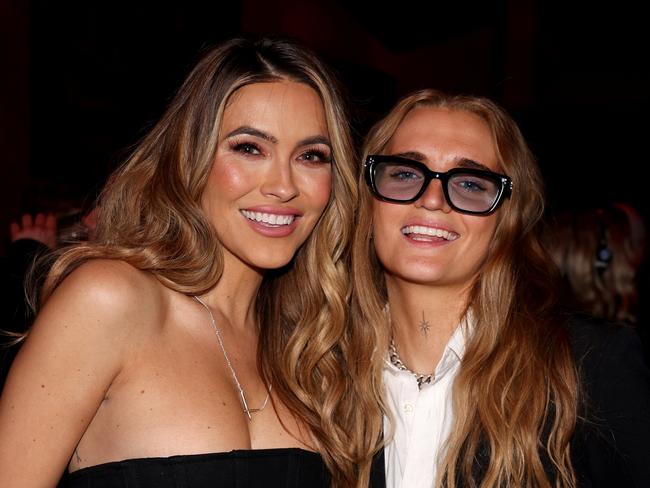 Chrishell Stause and partner G Flip at the 2023 AFLW season launch. Picture: Jonathan DiMaggio/AFL Photos/via Getty