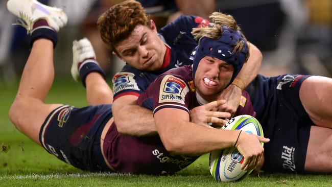 Hamish Stewart scores a try for the Reds against the Rebels at Suncorp Stadium. Picture: Getty Images