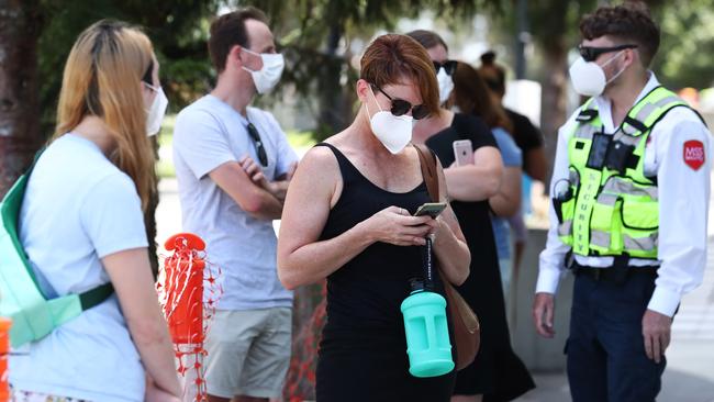 Gold Coasters waited in queues of up to two hours at the Gold Coast University Hospital on Saturday. Photograph: Jason O'Brien