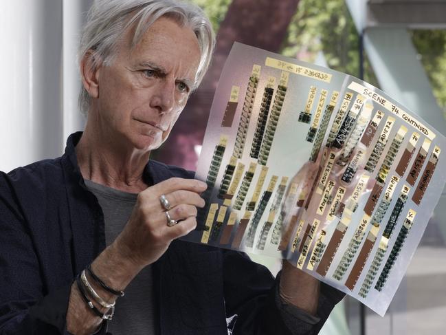 ADELAIDE, AUSTRALIA - Advertiser Photos OCTOBER 12, 2023: Filmmaker Scott Hicks' with 16mm film edits that are part of his personal collection of film memorabilia to be on display in the State Library of Adelaide. Picture:  Emma Brasier