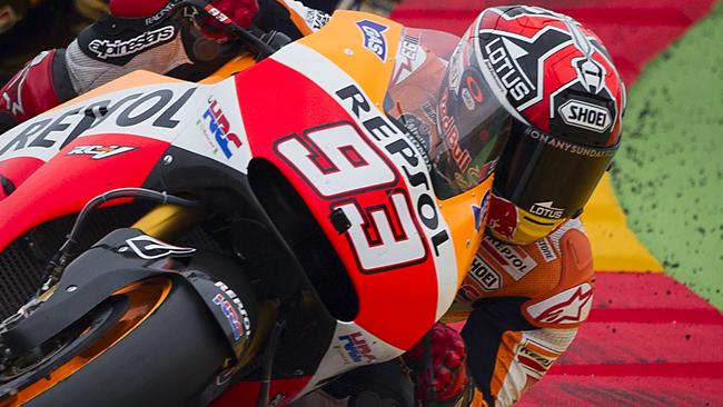 Repsol Honda's Spanish rider Marc Marquez competes in the MotoGP race Aragon Grand Prix at the Motorland racetrack in Alcaniz on September 28, 2014. AFP PHOTO/ JAIME REINA