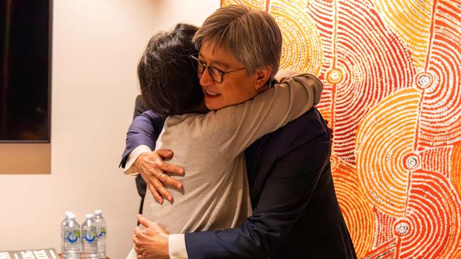 Foreign Affairs Minister Penny Wong (R) hugging Australian journalist Cheng Lei upon her arrival at the airport in Melbourne. . (Photo by Sarah Hodges / Department of Foreign Affairs and Trade (DFAT) / Australia Global Alumni / AFP) /