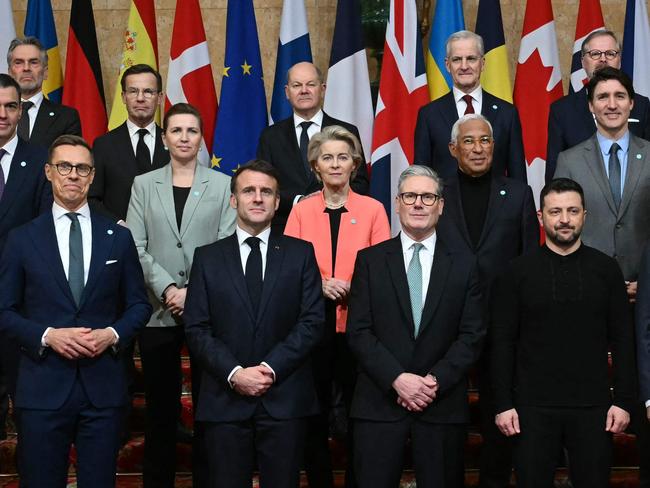 TOPSHOT - (Back row L-R) NATO secretary General Mark Rutte, Netherlands' Prime Minister Dick Schoof, Sweden's Prime Minister Ulf Kristersson, Germany's Chancellor Olaf Scholz, Norway's Prime Minister Jonas Gahr Store, Czech Republic's Prime Minister Petr Fiala, Turkey's Minister of Foreign Affairs Hakan Fidan, (Middle row L-R) Spain's Prime Minister Pedro Sanchez, Denmark's Prime Minister Mette Frederiksen, European Commission President Ursula von der Leyen, European Council President Antonio Costa, Canada's Prime Minister Justin Trudeau, Italy's Prime Minister Giorgia Meloni, Romania's Interim President Ilie Bolojan, (Front row L-R) Finland's President Alexander Stubb, France's President Emmanuel Macron, Britain's Prime Minister Keir Starmer, Ukraine's President Volodymyr Zelensky and Poland's Prime Minister Donald Tusk  pose for a family photograph during a summit held at Lancaster House in central London on March 2, 2025. European leaders descend upon London today for talks to "drive forward" action on Ukraine, according to the office of UK Prime Minister Keir Starmer. The summit caps off a week of intense diplomacy for host Starmer, who met with President Donald Trump on Thursday in an effort to draw together the European and US approaches to the Ukraine conflict. (Photo by JUSTIN TALLIS / POOL / AFP)