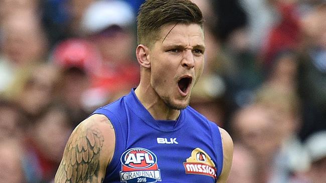 Clay Smith celebrates a goal in the Grand Final.