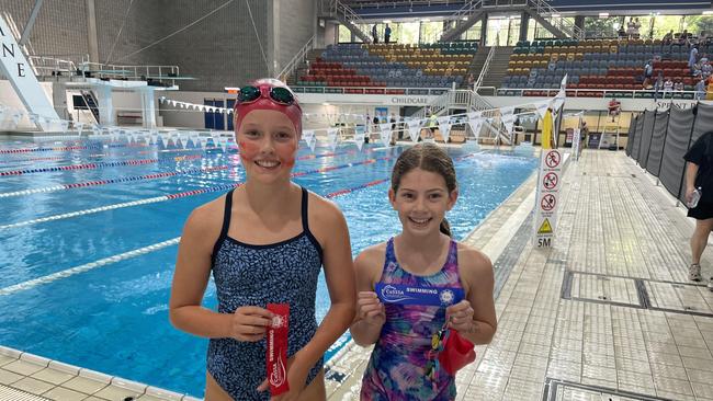 Mary MacKillop's Patience Flynn, right, with Stuartholme's Isla Anderson.