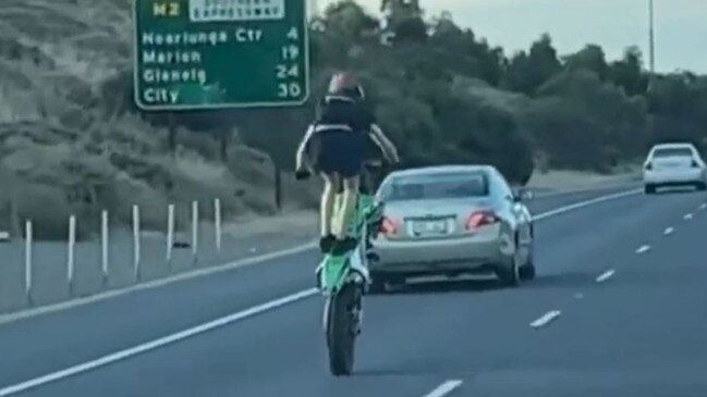 The motorcyclist was caught standing on his bike. Picture: 7NEWS