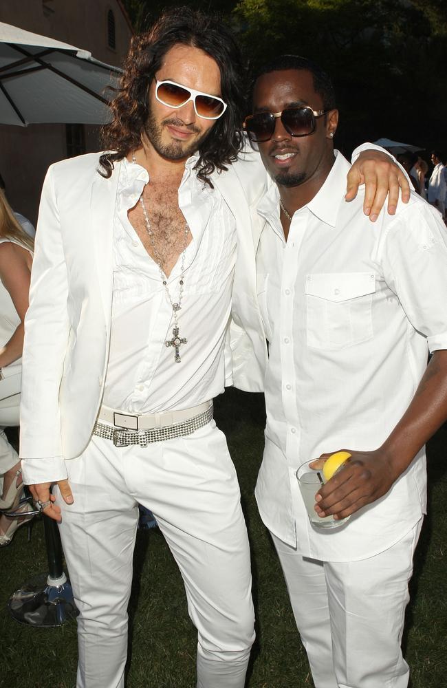 Actor Russell Brand and Sean ‘Diddy’ Combs attend the White Party. There is no suggestion Brand or any other celebs at Diddy’s parties knew about alleged drug taking or orgies. Picture: Jason Merritt/Getty Images/Getty Images for Blueflame