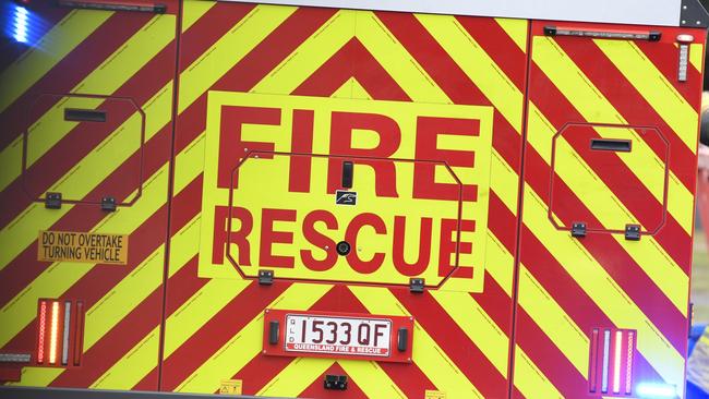 Fireys attend a house fire in Toowoomba, fire and rescue sign generic, QFES, Friday, June 23, 2023. Picture: Kevin Farmer