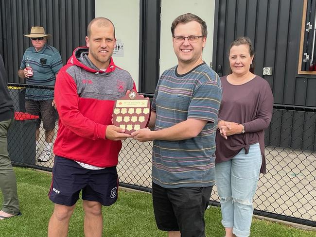 Jack Lawler presents the Peter Lawler Memorial Shield to Paul Hill.