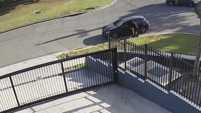 CCTV has been released appearing to show a man dressed in dark clothing and holding a yellow-coloured can.