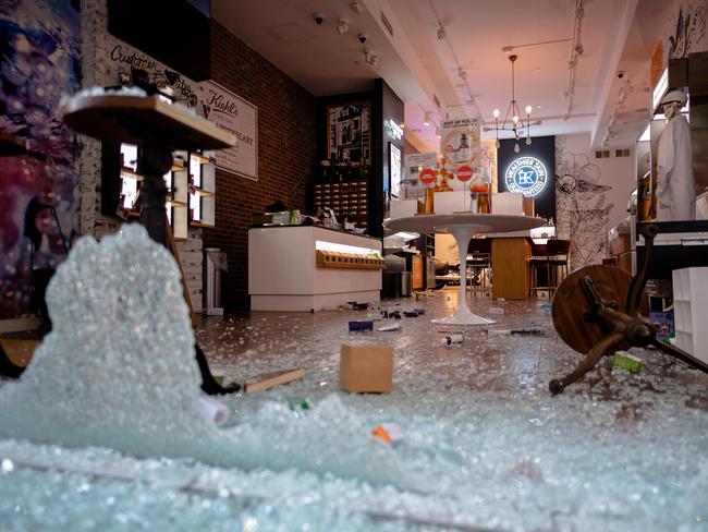 A looted and destroyed shop is seen after a night of protest in Lower Manhattan in New York City. Picture: AFP