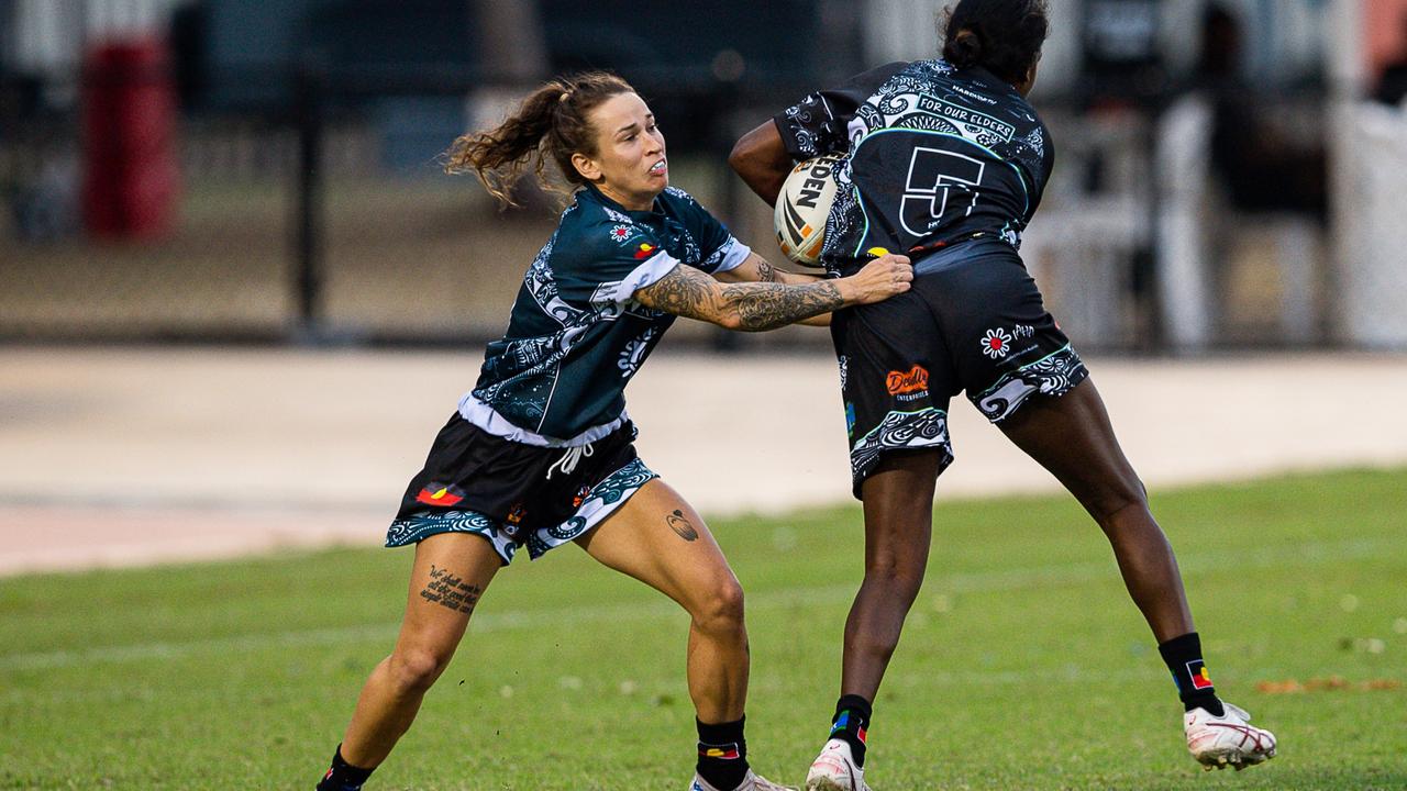 Rhiannon Fecht makes a tackle in the Deadly Cup Carnival. Picture: Pema Tamang Pakhrin