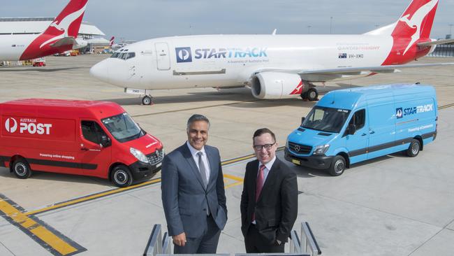 This announcement, with Australia Post chief executive Ahmed Fahour and Qantas boss Alan Joyce, about new mail planes, is what we were supposed to be talking about. Source: James Morgan