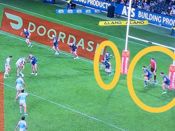 Eels players blatantly offside against the Titans.