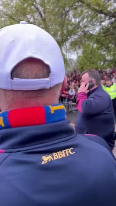 Brisbane Lions celebrate with fans in Fitzroy