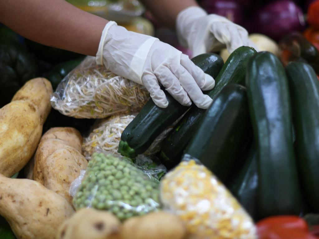 Food experts have urged people not to wash their fruit and vegetables with soap after a viral video advised them to do so. Picture: Johan ORDONEZ / AFP