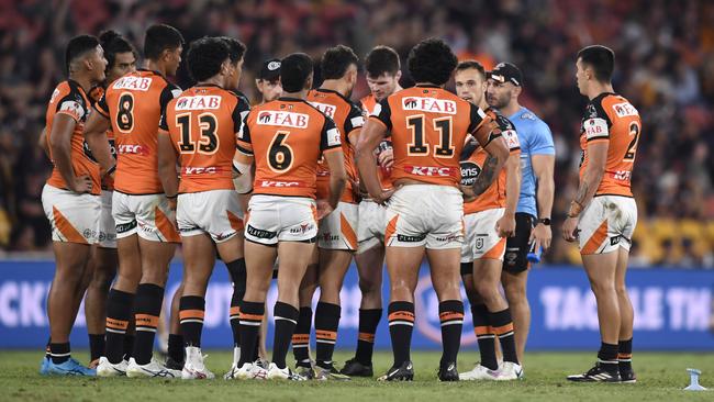 Wests Tigers players show their dejection after a try. Picture: NRL Photos