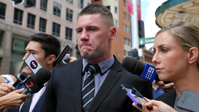 Shaun Kenny-Dowall with his legal team tight after the verdict. Picture: John Grainger